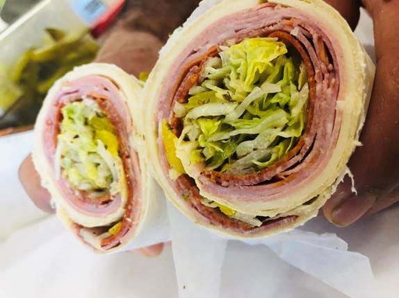 A close up of a sandwich

Description automatically generated