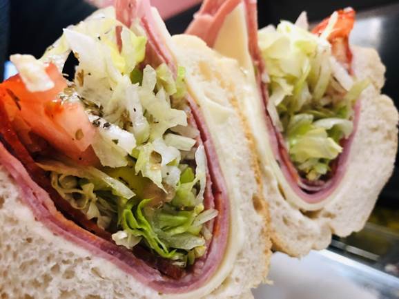 A close up of a sandwich

Description automatically generated